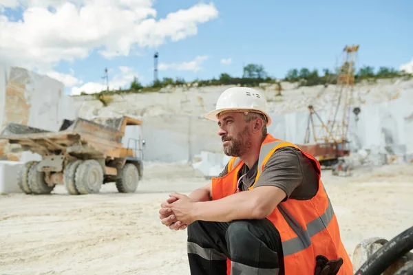 Tired Worker Marble Quarry Sitting Front Camera Workplace Dump Truck — Stock Photo, Image