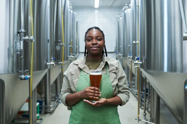 Portrait Positive Female Worker Uniform Showing Glass Beer Produced Her — Stock Photo, Image