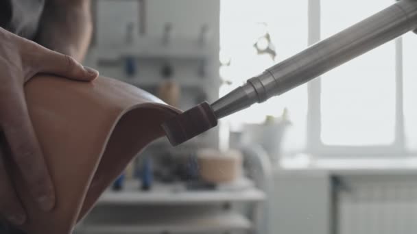 Close Unrecognizable Craftsman Working Prosthetic Limb Using Grinder Smooth Edge — Stok Video