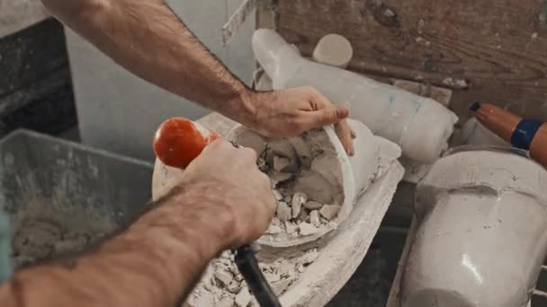 High Angle Shot Unrecognizable Man Removing Plaster Used Cast Plastic — Stock Video