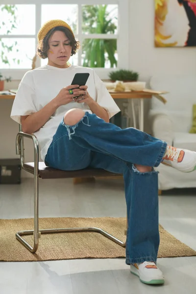 Young Serious Female Zoomer Casualwear Scrolling Online Data While Searching — Stock Photo, Image