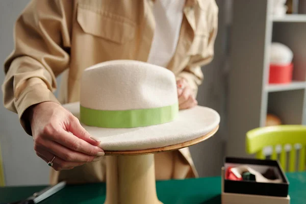Close Hands Young Craftswoman Putting White Felt Hat Light Green — Stock Photo, Image