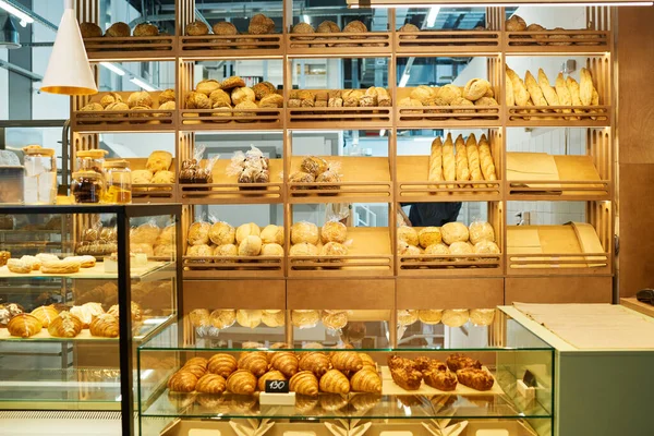 Counter Desk Bakery Clerk Displays Fresh Bread Pastry Assortment Being — Stock Photo, Image
