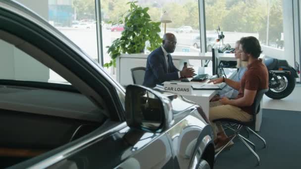 Long Shot Young Ethnically Diverse Couple Buying New Car Dealership — Stock Video