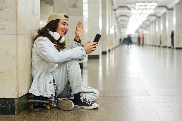 Happy Teenage Boy Waving Hand His Friend Smartphone Screen While — Stock Photo, Image
