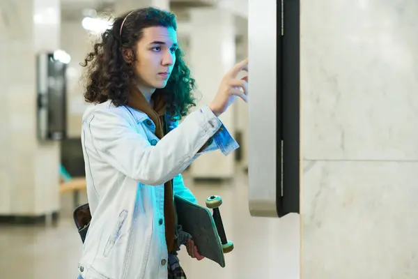 Serious Teenage Guy Scrolling Timetable Subway Trains While Standing Front — Stock Photo, Image