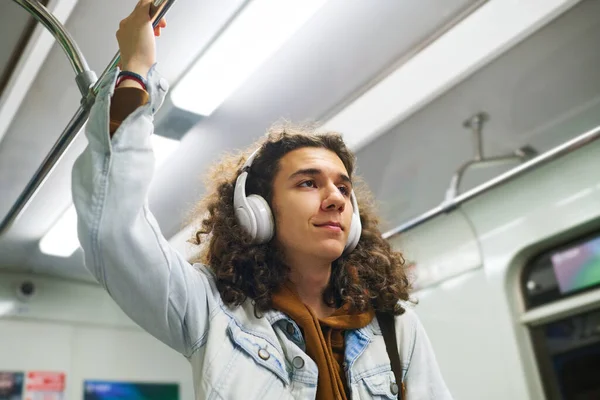 Smiling Teenager Denim Jacket Holding Handrail Subway Train While Riding — Stock Photo, Image