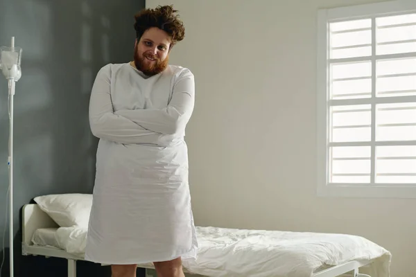 Young Overweight Man White Straitjacket Standing Front Camera His Bed — Stock Photo, Image