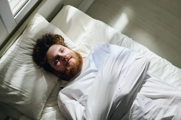 Angle Young Bearded Man Straitjacket Suffering Schizophrenia Lying Bed Ward — Stock Photo, Image