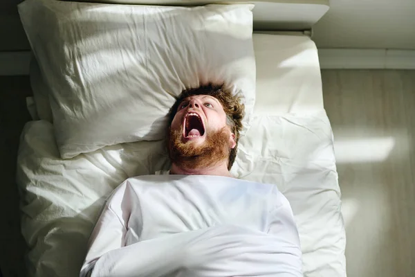 Young Insane Man Psychosis Straitjacket Shouting While Lying Bed Mental — Stock Photo, Image