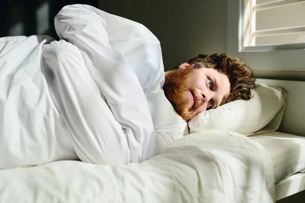 Young Deranged Man Straitjacket Suffering Panic Attack Psychosis Lying Bed — Stock Photo, Image