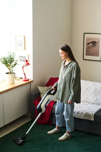 Vertical Image Young Woman Vacuuming Carpet Vacuum Cleaner Housework Room — Stock Photo, Image