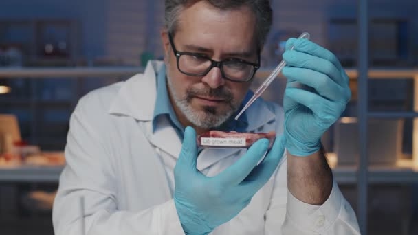 Mature Scientist Gloves Lab Coat Adding Some Drops Serum Piece — Stok video