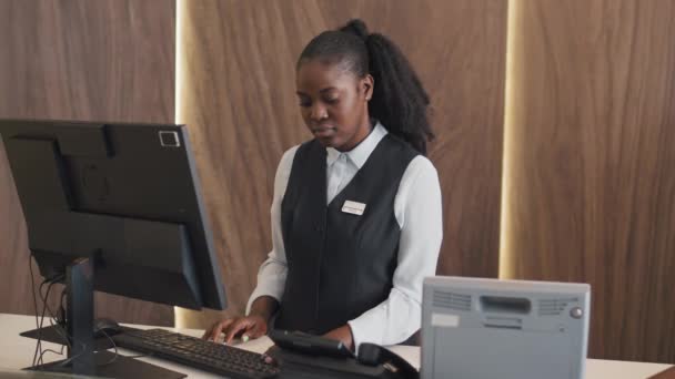 Slow Motion Medium Portrait Young Adult African American Receptionist Standing — Stock Video
