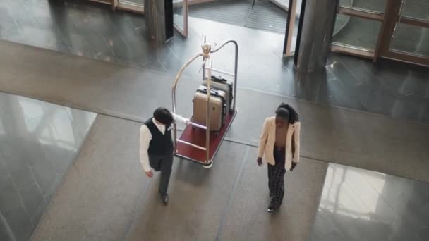 View Shot Bellboy Luggage Trolley African American Woman Walking Reception — Stock Video