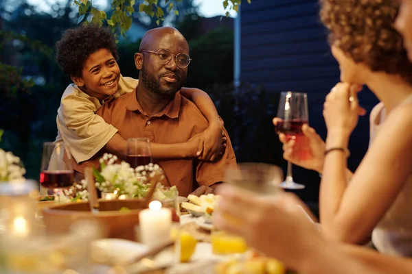 Happy Boy Embracing His Father Looking His Wife Glass Red — Stock Photo, Image