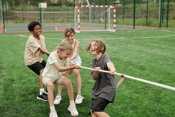 Cheerful Schoolkids Activewear Laughing While Pulling Rope Sports Competition Another — Stock Photo, Image