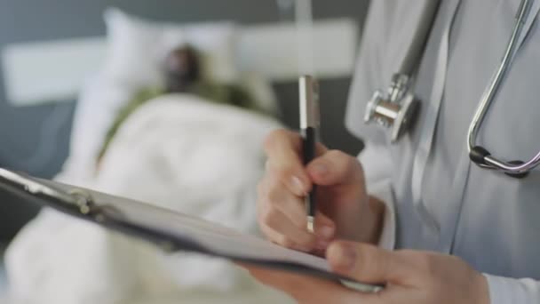 Selective Focus Close Unrecognizable Doctor Holding Clipboard Making Notes Patients — Stock Video