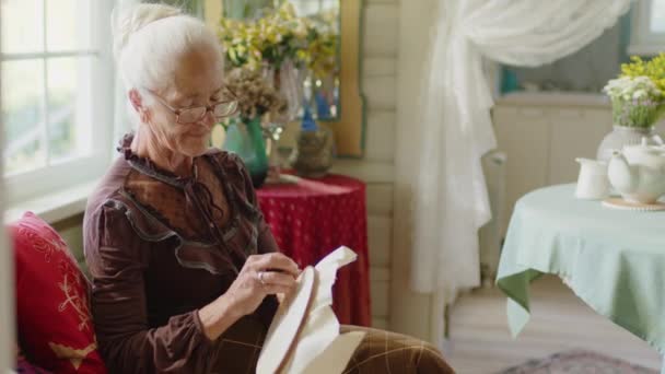 Medium Shot Grandmother Spending Time Home Embroidering Picture Grandmacore Aesthetics — Stock Video