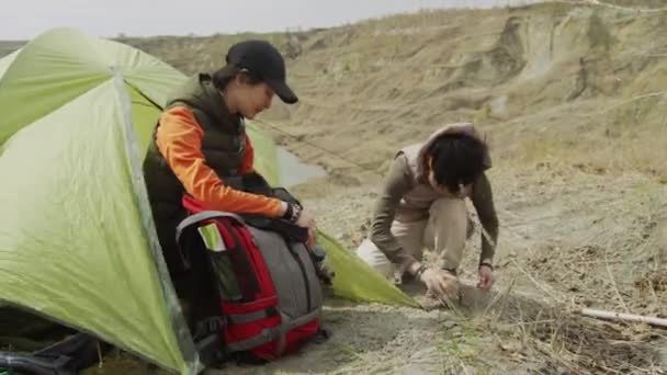 Full Shot Two Young Female Asian Tourists Hiking Barren Lake — Stock Video
