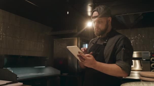 Medium Shot Young Bearded Caucasian Man Chef Uniform Standing Dimly — Stock Video