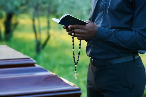 Close African American Man Priest Attire Holding Rosary Beads Open — Stock Photo, Image