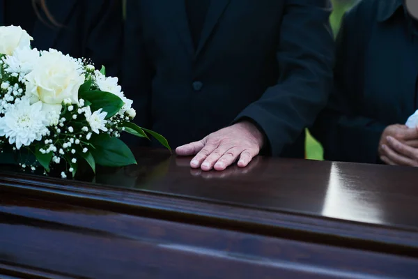 Close Mature Man Keeping Hand Top Closed Lid Coffin Dead — Stock Photo, Image