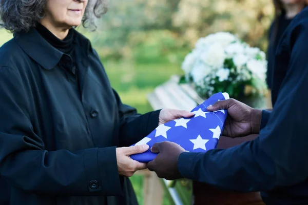 Mature Grieving Widow Black Attire Taking Folded Stars Stripes Flag — Stock Photo, Image