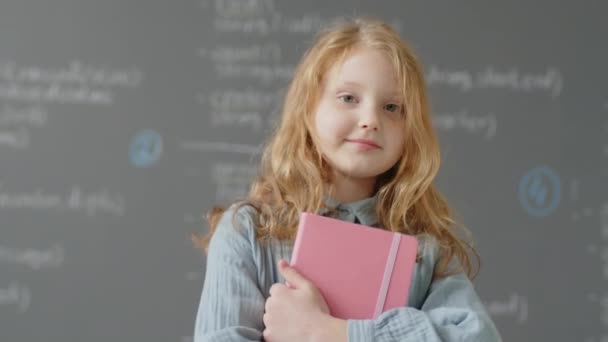 Slowmo Portrait Caucasian Elementary School Girl Posing Front Blackboard Classroom — Stock Video