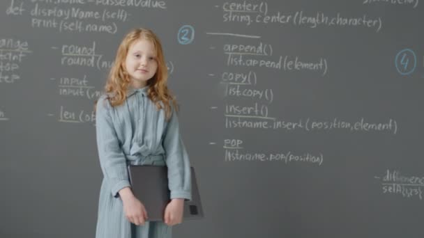 Slowmo Medium Portrait Caucasian Elementary Age Girl Coming Blackboard Holding — Stock Video
