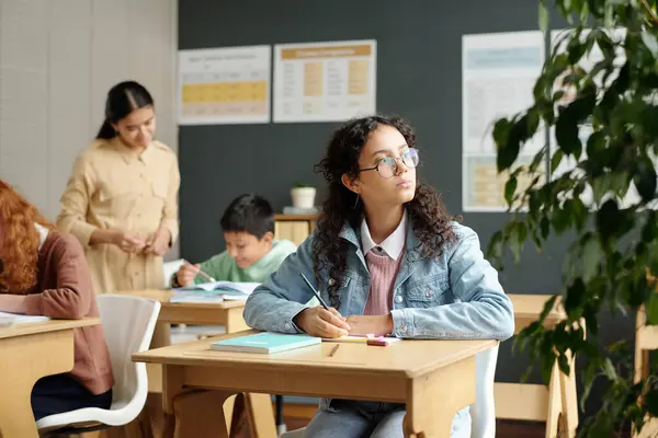 Cute Pensive Secondary School Learner Looking Window Classroom While Sitting — Stock Photo, Image
