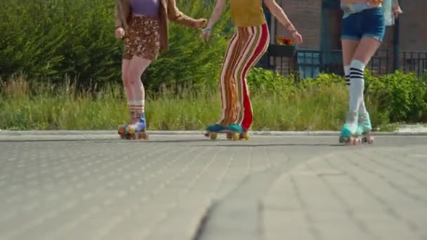 Ground Level Tracking Shot Legs Three Young Women Riding Colorful — Wideo stockowe