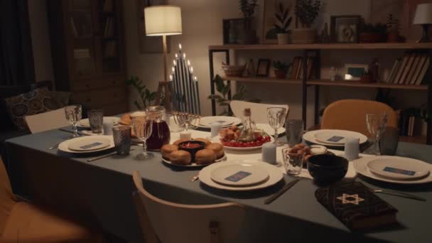 Medium Full Shot Table Prepared Hanukkah Dinner Family Home Hanukkiah — Αρχείο Βίντεο