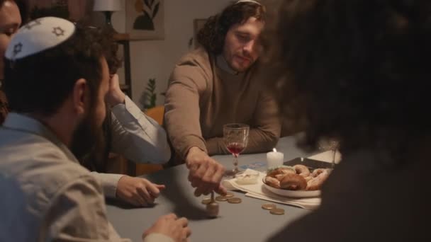 Medium Shot Cheerful Jewish Family Members Playing Wooden Dreidel Hanukkah — Stock Video