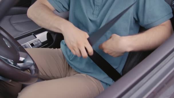 Medium Cropped Shot Unrecognizable Driver Fastening Seatbelt Driving Car — Stock Video
