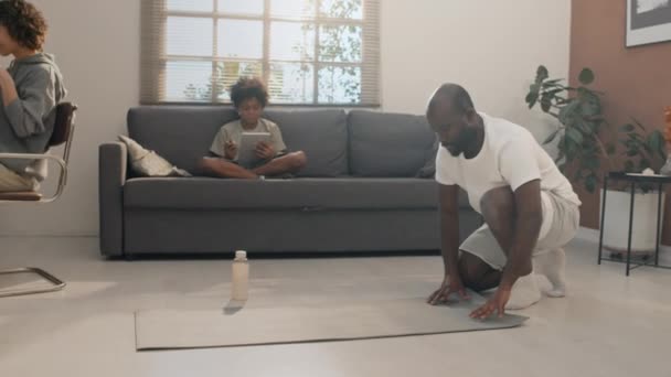 Full Shot Father Getting Ready Yoga Exercises While His Son — Stock Video