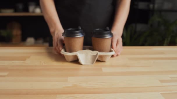 Close Shot Unrecognizable Caucasian Barista Giving Customer Two Plastic Cups Royalty Free Stock Footage