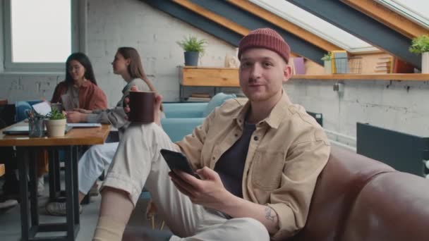 Medium Portrait Shot Young Male Caucasian Freelancer Beanie Hat Sitting — Stock videók