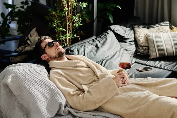 Restful Guy Bathrobe Sunglasses Holding Glass Red Wine Hand While — Stock Photo, Image