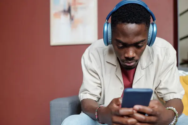 African American Guy Headphones Looking Playlist While Sitting Front Camera — Stock Photo, Image