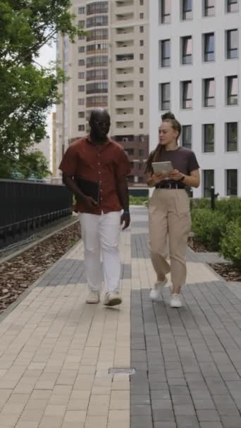 Vertical Full Footage Diverse Coworkers Walking Urban Park Laptop Tablet — Stock Video