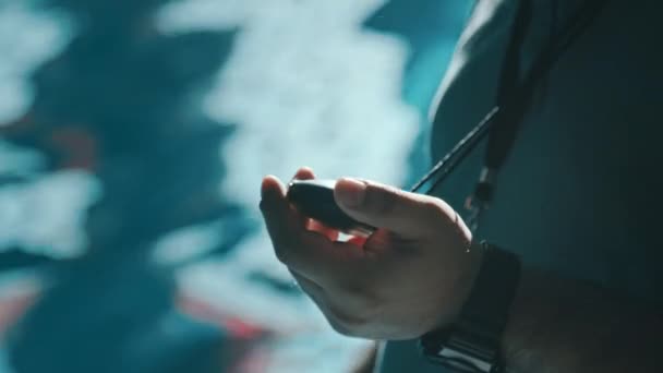 Close Tilt Footage Hand Face Asian Swimming Instructor Pressing Stop — Vídeo de Stock