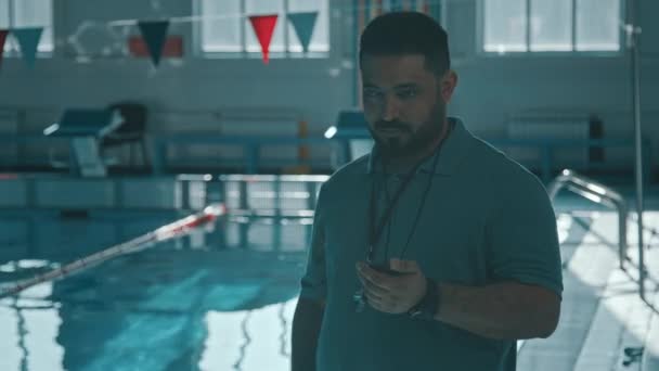 Medium Shot Lens Flare Middle Eastern Male Swim Instructor Whistle — Stock Video