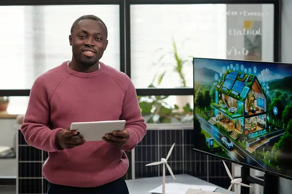 Young Smiling Businessman Tablet Networking Organizing Work Looking Camera While Stock Photo