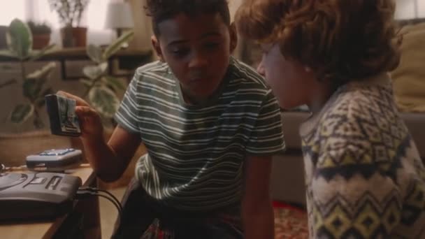 Side Handheld Footage Caucasian African American Millennial Kids Looking New — Vídeos de Stock