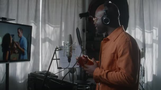 Medium Shot African American Male Voice Actor Headphones Performing Part — Video