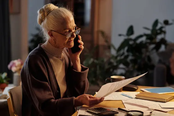 Senior Woman White Hair Sitting Table Financial Bills Speaking Worker Stock Image