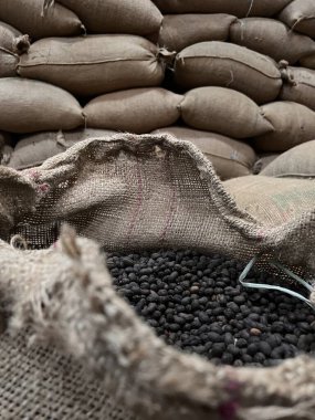 textile bag filled with roasted coffee beans waiting to be sold, Sidama, Ethipoia