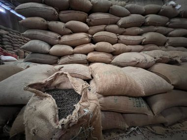 textile bag filled with roasted coffee beans waiting to be sold, Sidama, Ethipoia