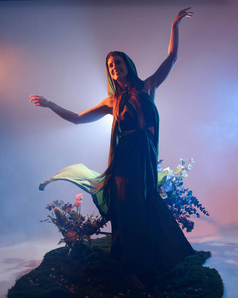 Драматический портрет женщины-модели в зеленом костюме эльфийского плаща с плавающей сфабрикованностью..